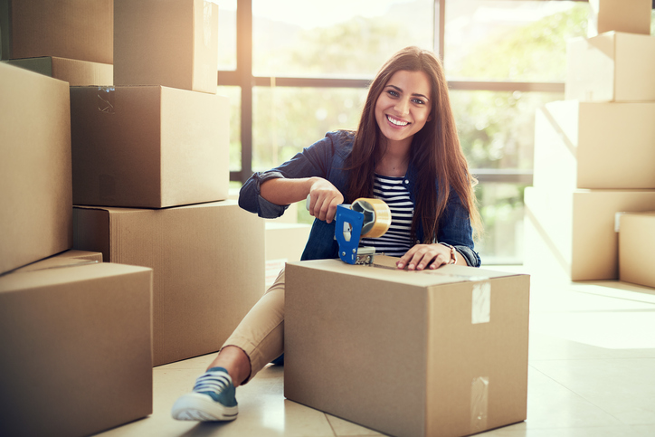 woman checking off packing list